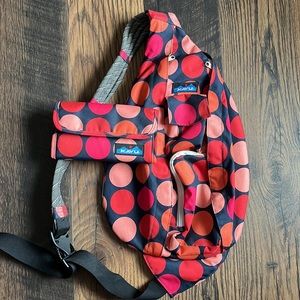 COPY - Multicolor polkadotted Kavu crossbody bag and matching wallet.